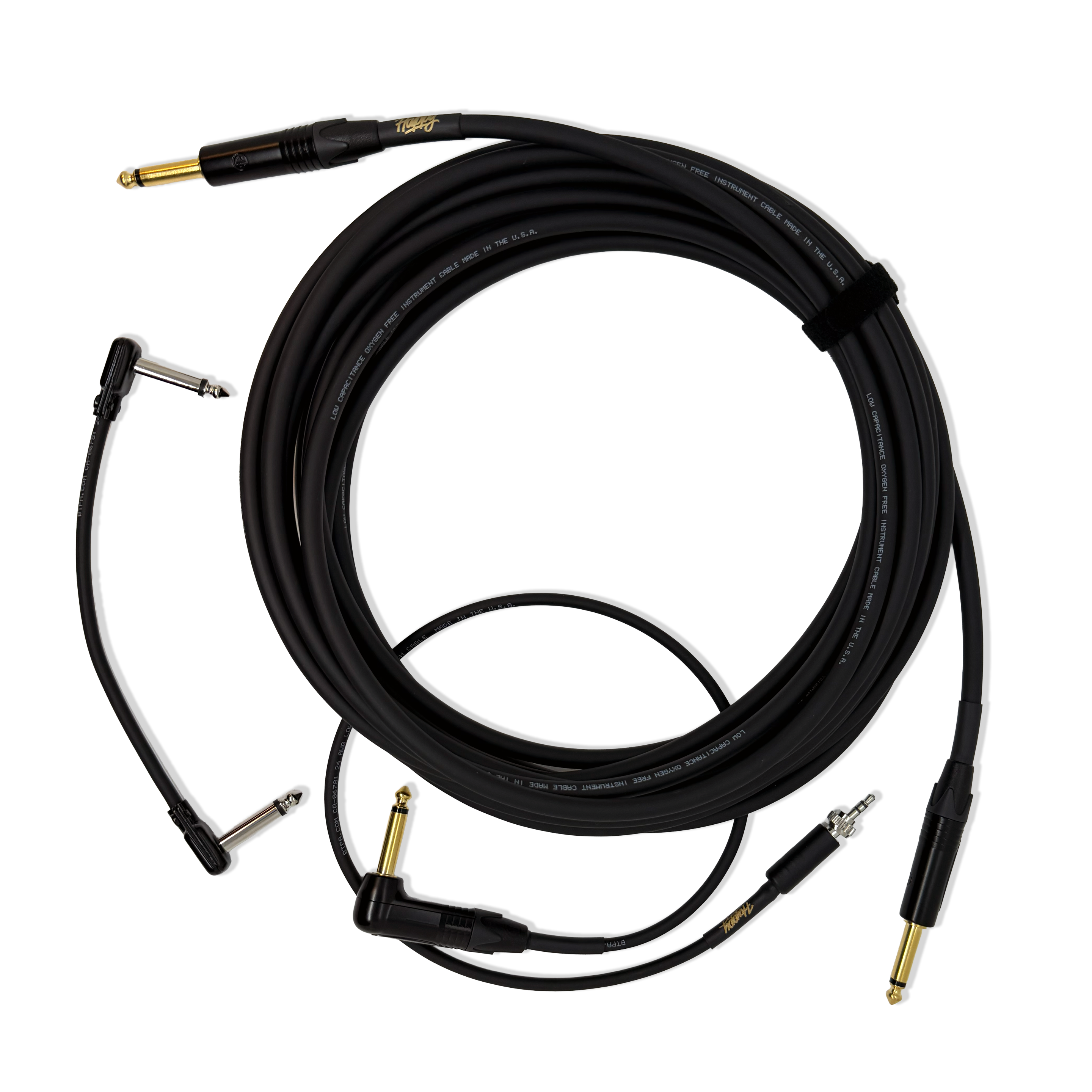 Black guitar cables with angled connectors on a white background